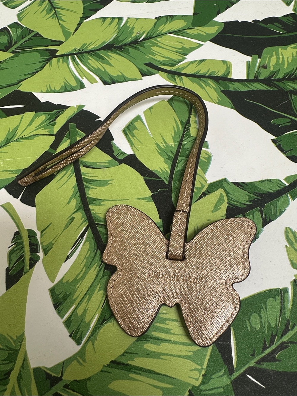 Michael Kors Metallic Rose Gold Butterfly Bag Charm